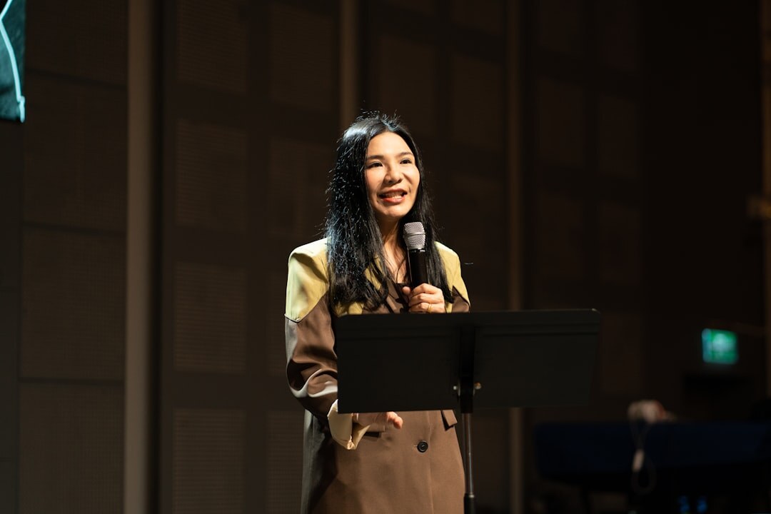 Person practicing speech on stage