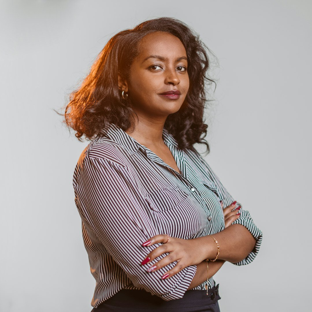 Female coach with warm smile in professional attire